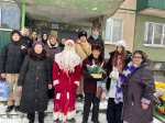 Школьники поздравили ветерана войны и труда Николая Беляева с новогодними праздниками